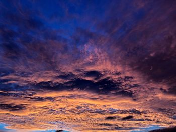 Scenic view of dramatic sky during sunset