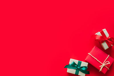 Low angle view of red box against colored background