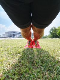 Woman standing on field