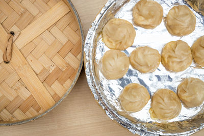 High angle view of cake in basket on table