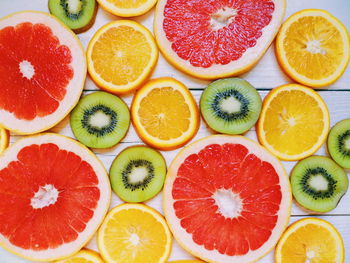 Directly above shot of multi colored fruits in container