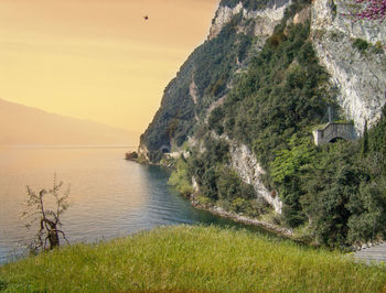 Scenic view of sea against sky at sunset