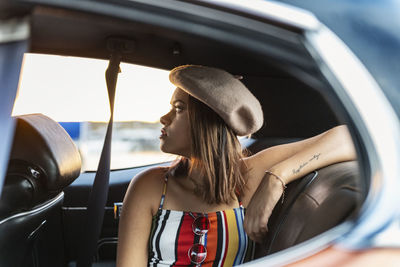 Teenage girl in car