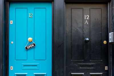 Text on closed blue door