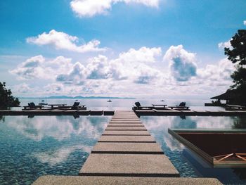 Empty jetty leading to sea