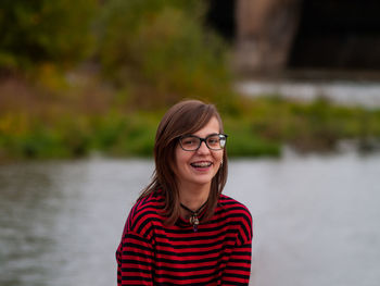 Portrait of smiling girl in lake