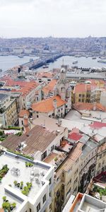 High angle view of buildings in city against sky