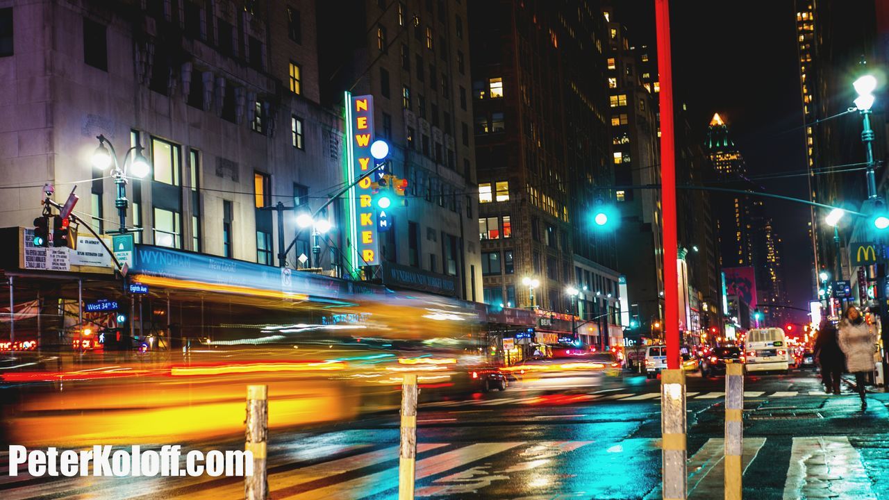 illuminated, night, city, building exterior, architecture, built structure, transportation, long exposure, motion, light trail, street, city life, speed, blurred motion, city street, street light, road, lighting equipment, on the move, car