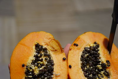Close-up of orange fruits on table