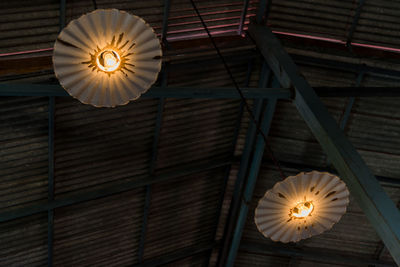 Low angle view of illuminated light bulb