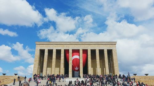 Low angle view of historical building against cloudy sky