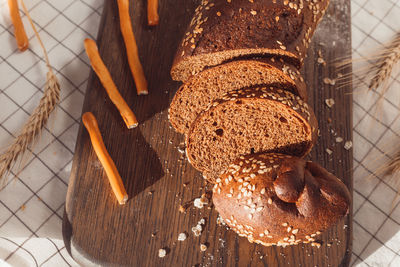 High angle view of bread on cutting board