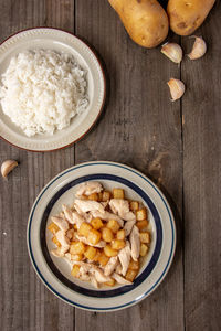 High angle view of chopped fruits in bowl on table