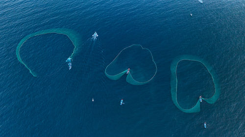 High angle view of people on road