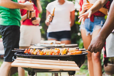 Group of people on barbecue grill