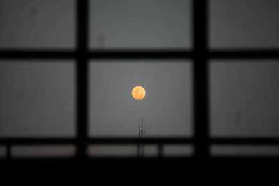 Low angle view of sky seen through window