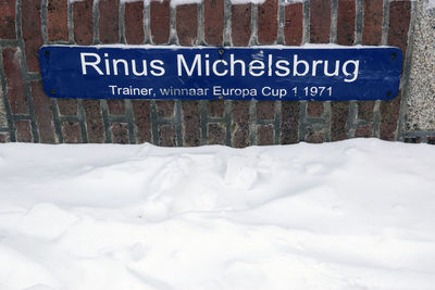 Close-up of text on snow