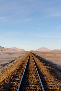 Surface level of railroad tracks on desert