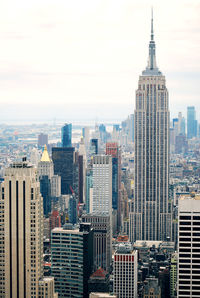 Modern buildings in city against sky