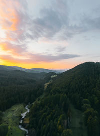 Scenic view of mountains against sky during sunset