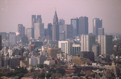 Modern buildings in city against sky