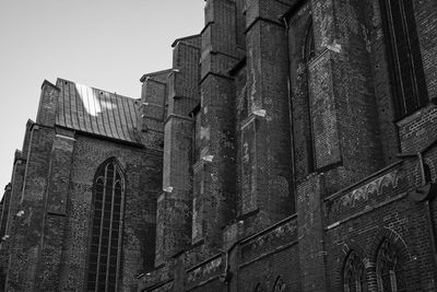 Low angle view of old building against sky