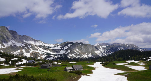 Scenic view of snowcapped mountains against sky