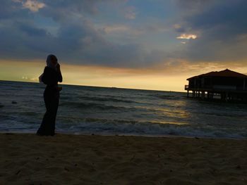 Scenic view of sea at sunset