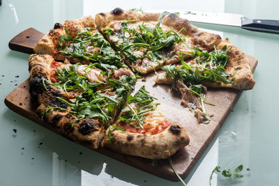 High angle view of pizza in plate on table