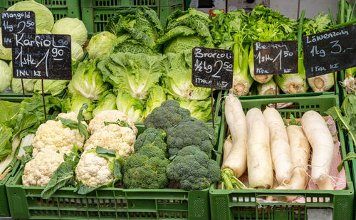 Broccoli, cauliflower and radish for sale at a market