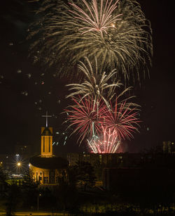 Firework display at night