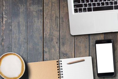 High angle view of coffee cup on table