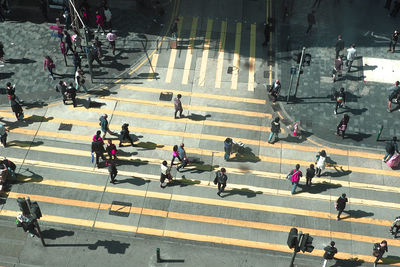 High angle view of people crossing road