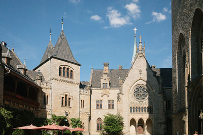 Low angle view of buildings against sky