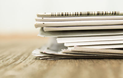 Close-up of stacked stack on table