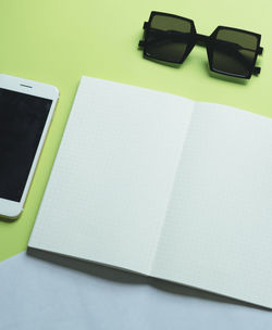 Close-up of laptop on table against white background