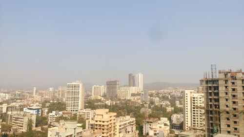 Cityscape against clear sky