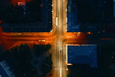 High angle view of illuminated city street at night