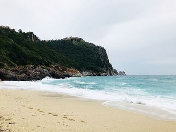 Scenic view of beach against sky