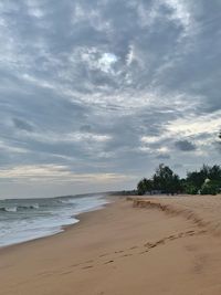 Scenic view of beach against sky