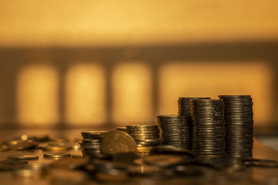 Close-up of coins on table