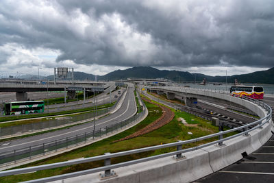 Aerial view of highway against sky in city