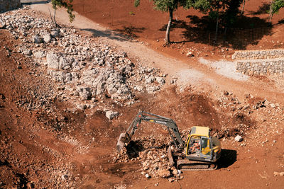 High angle view of bicycles on rock