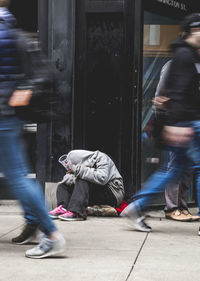 People on street in city