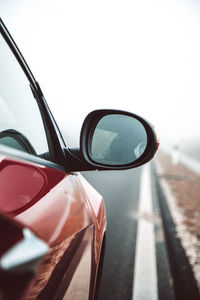 Close-up of side-view mirror