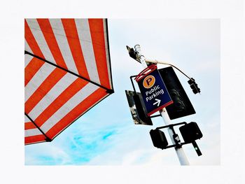 Low angle view of flag against sky