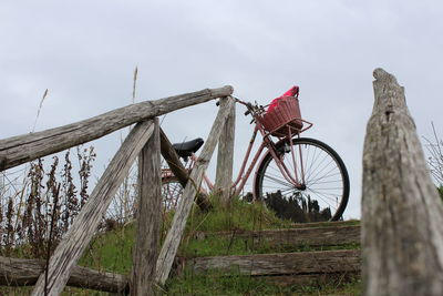 Low angle view of bicycle against sky