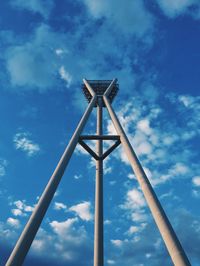 Low angle view of windmill against sky