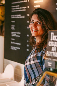 Portrait of a smiling young woman