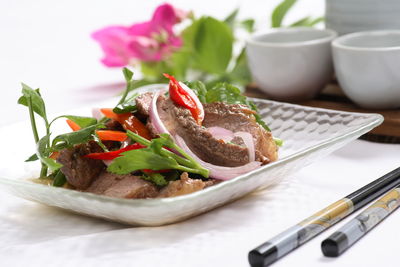 Close-up of salad in plate on table